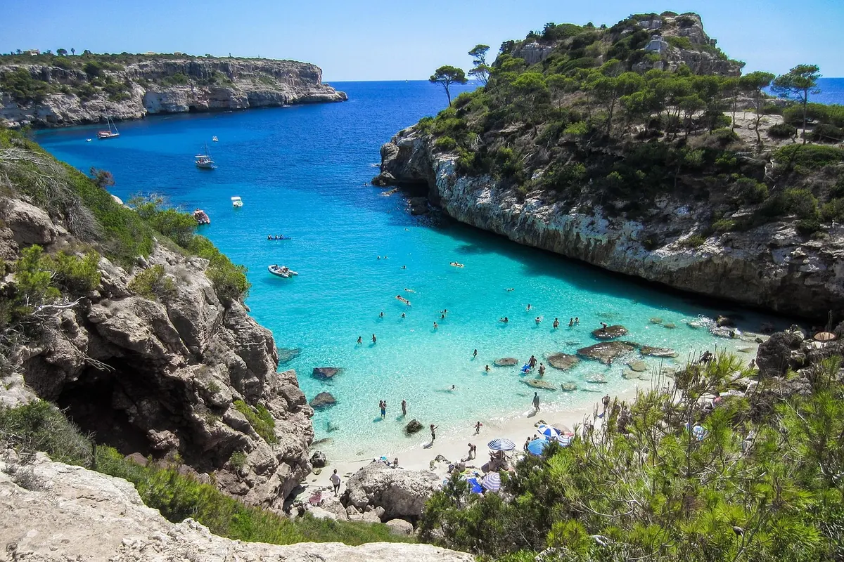 Turquoise water below the cliffs of a Majorca cove