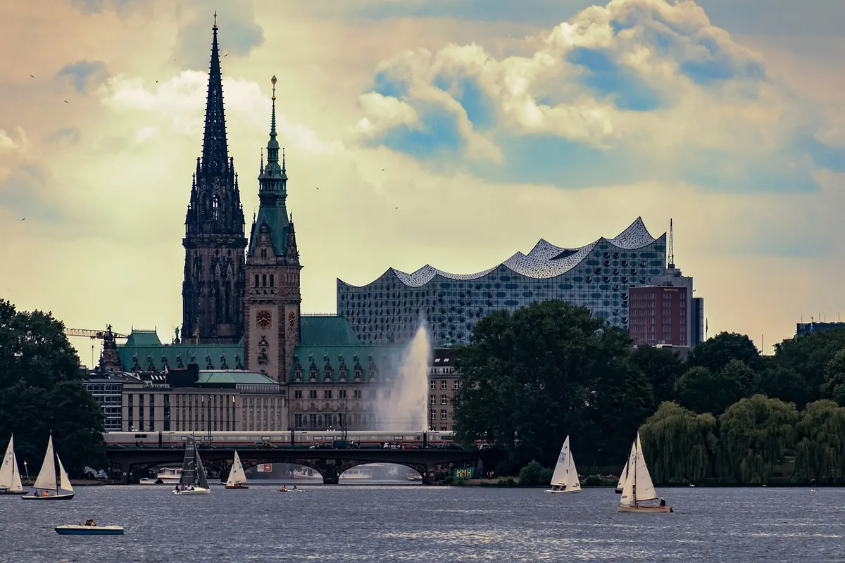 Boats on the Alster with Hamburg's spires behind