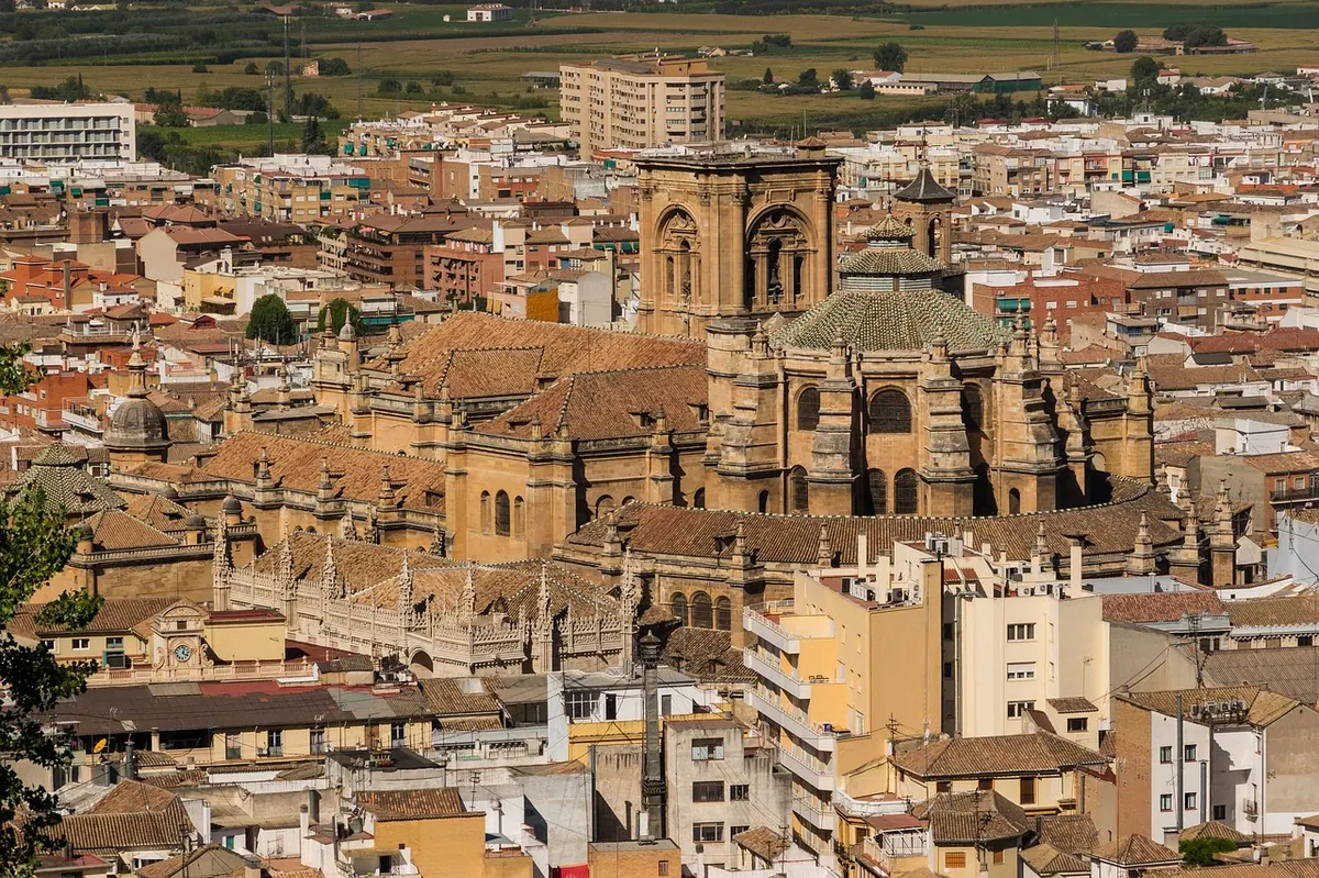 Granada Cathedral above the city rooftops