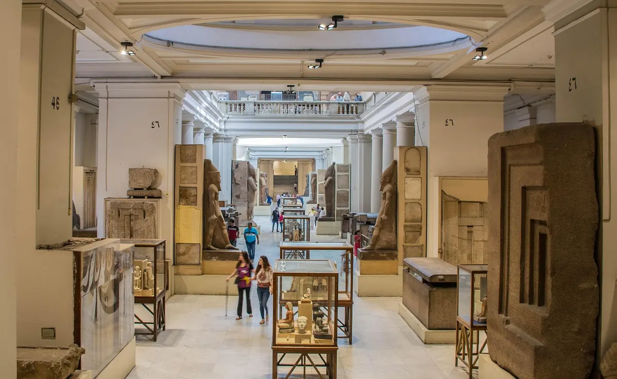 Ancient Egyptian sculpture in a museum gallery