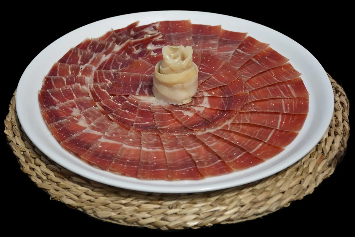 A plate of sliced jamón