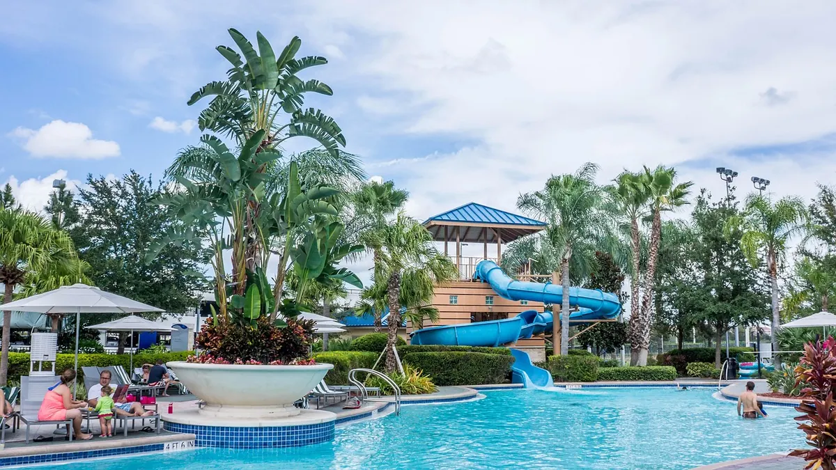 A resort pool with waterslides