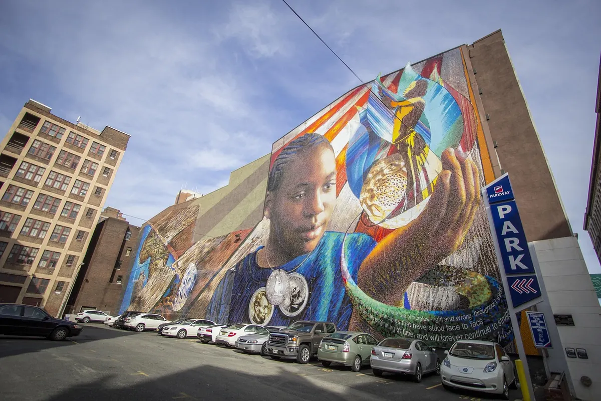 A large mural on a building in Philadelphia
