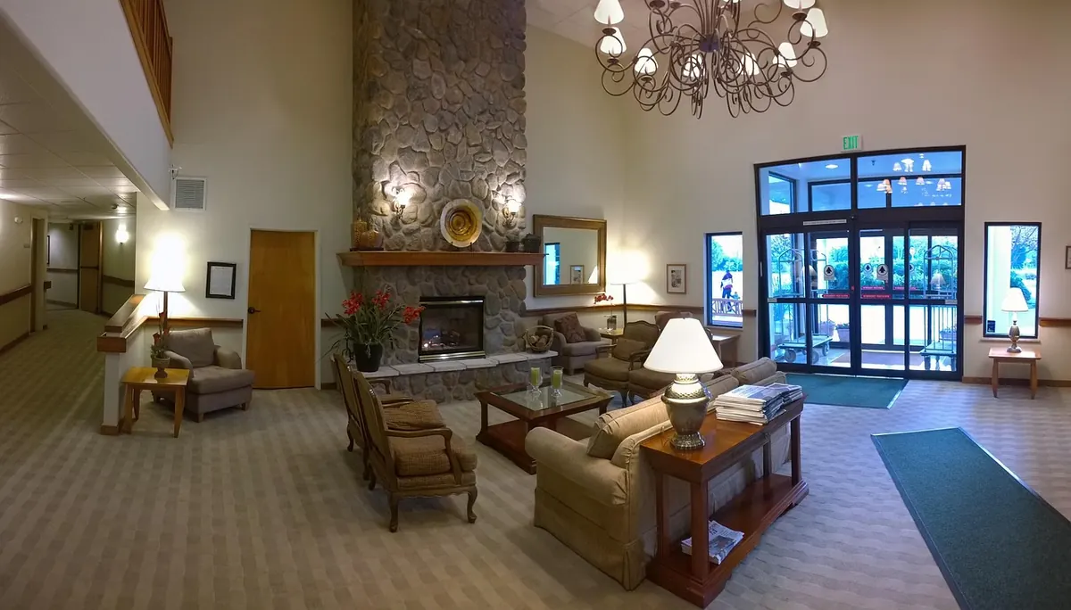 A hotel lobby with a fireplace