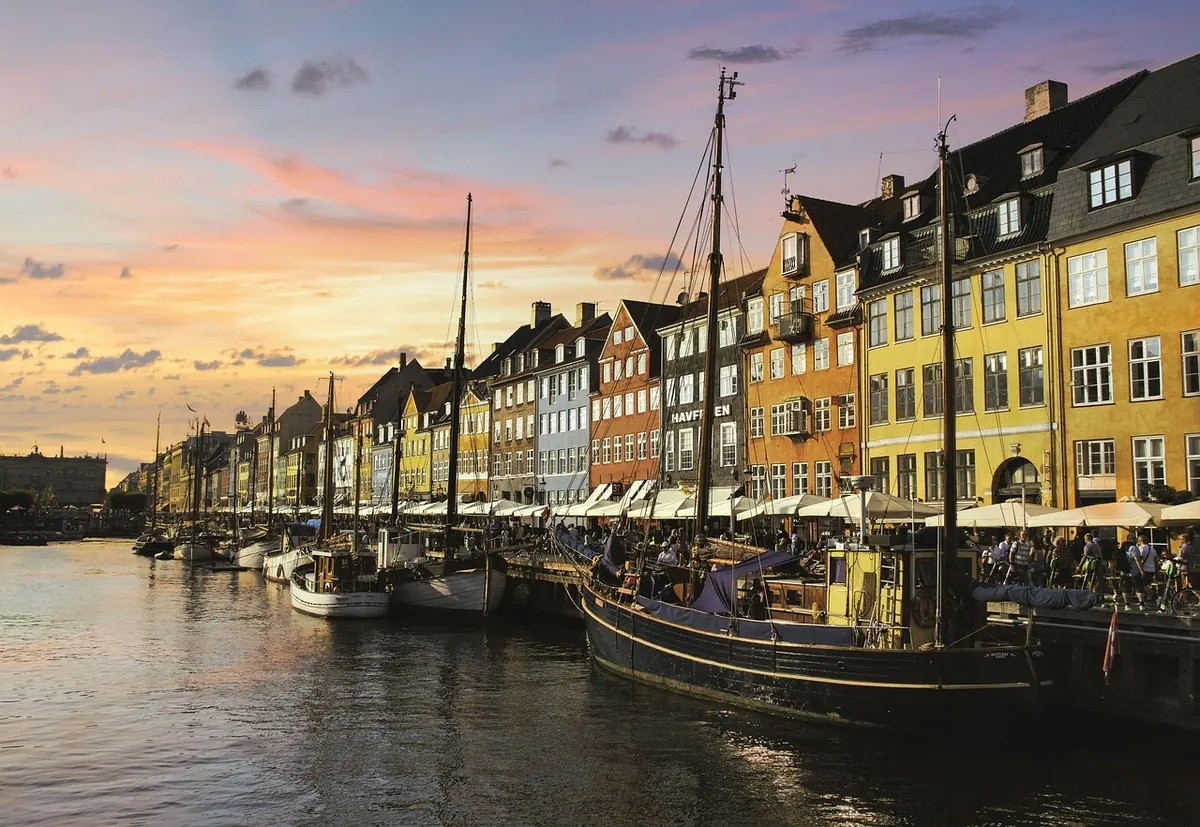 Boats in Copenhagen harbour at sunset