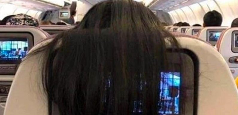 Plane passenger branded ‘disgusting’ for draping hair over the screen behind her