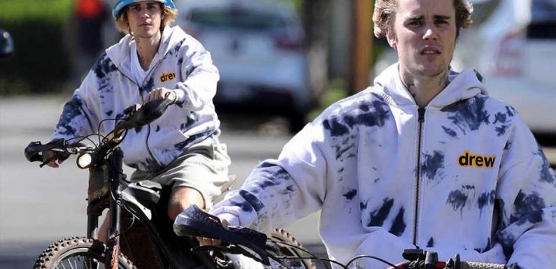 Justin Bieber puts the pedal to the metal for a ride in Hawaii