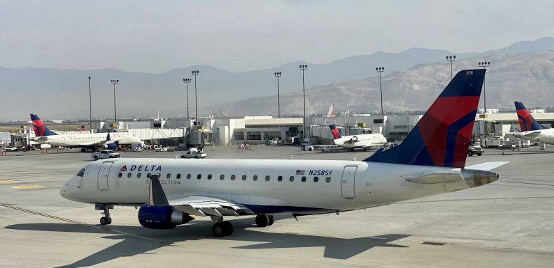 Delta Passenger Allegedly Hits Flight Attendant, Tries To Open Plane Cabin Door In Midair