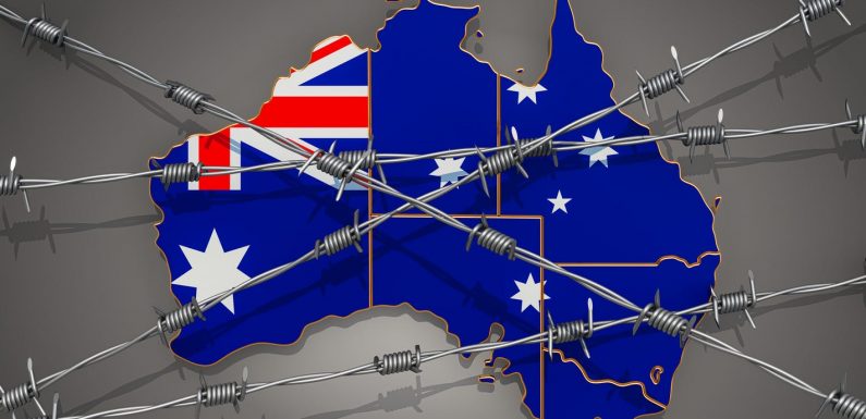 Australia extends international travel ban through at least mid-June