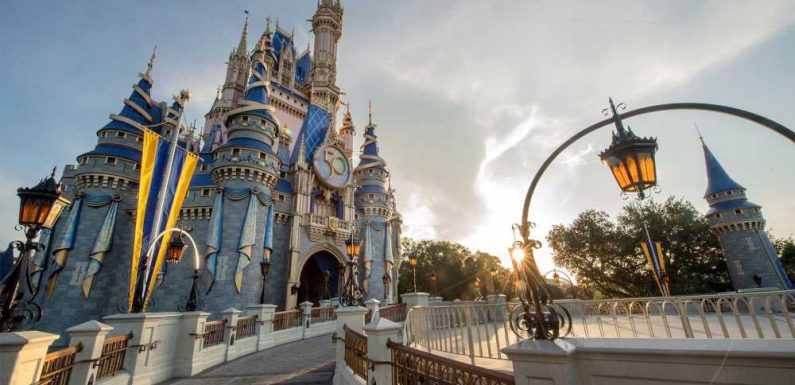 Cinderella Castle gets golden crest to celebrate Disney's 50th anniversary