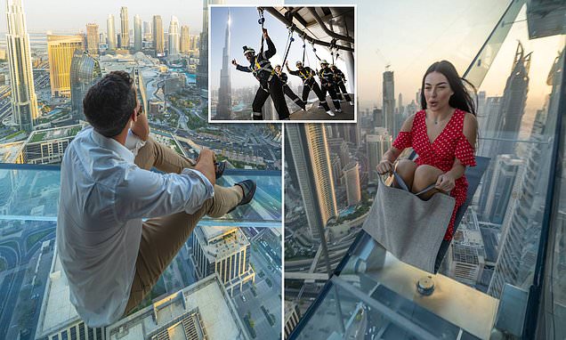 Dubai's Sky Views attraction features a glass walkway and glass slide