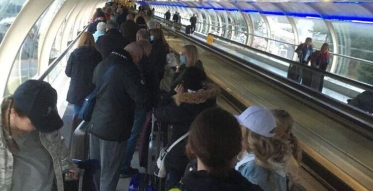 ‘Absolute shambles’ British tourists rage at ‘massive queues’ at Manchester airport