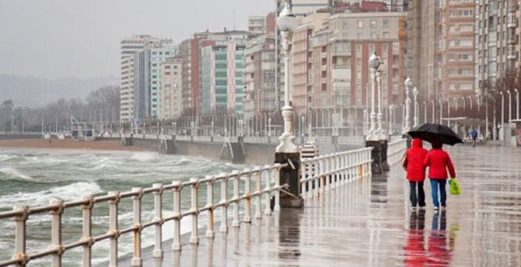 Britons face Spain holiday hell: Holidaymakers arrive to cold, rain and decimated beaches