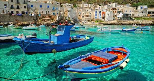 ‘Hidden gem’ Italian island with crystal clear water and ancient cave drawings