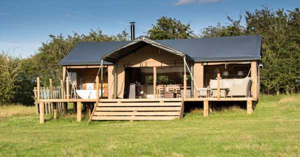 Inside luxury glamping lodges with impressive lake views and hot tubs