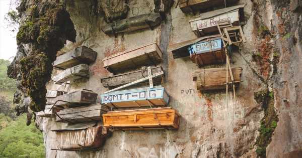 You can visit a cliffside covered in hanging coffins due to a haunting ritual