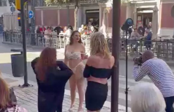 Models rip off clothes and bare breasts to gobsmacked locals in Costa del Sol