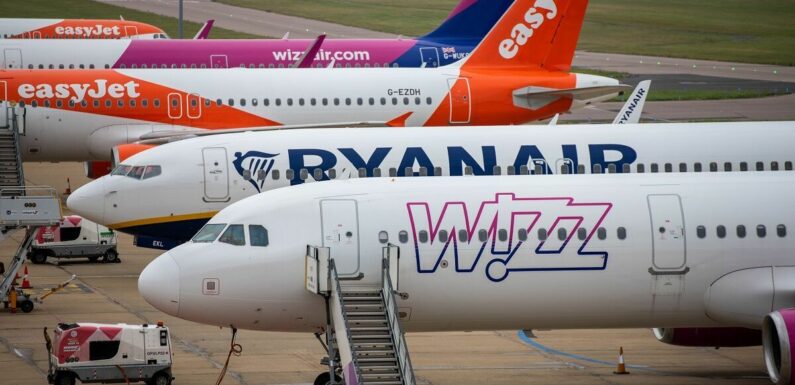 Third of UK airport flights delayed in major staff shortage