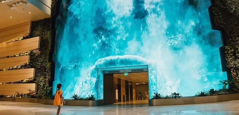 ‘World’s best airport’ gets futuristic with robot waiters and digital waterfall