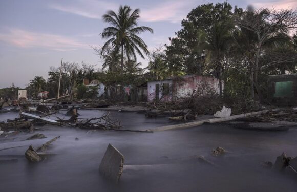 Pictured: The last residents of a town destroyed by climate change